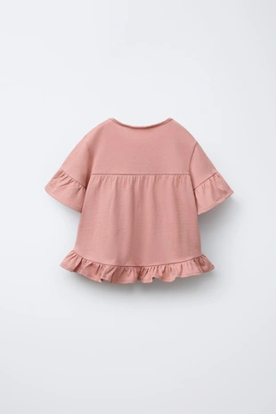 Однотонная футболка с воланами- Заказать в России