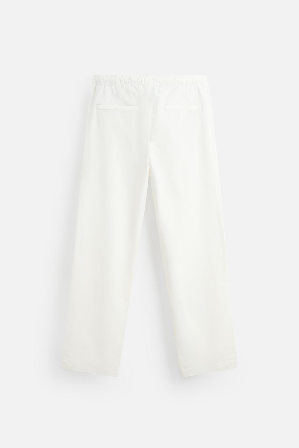 Брюки с карманами regular fit и эластичным поясом