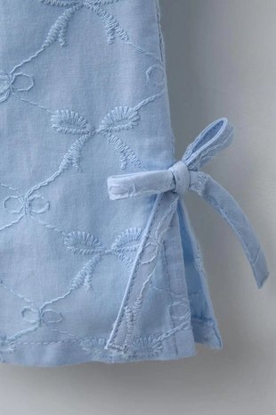 Брюки с вышивкой в виде бантов- Заказать в России