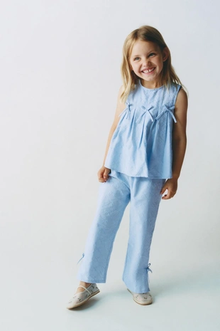 Топ с вышивкой и бантами- Заказать в России