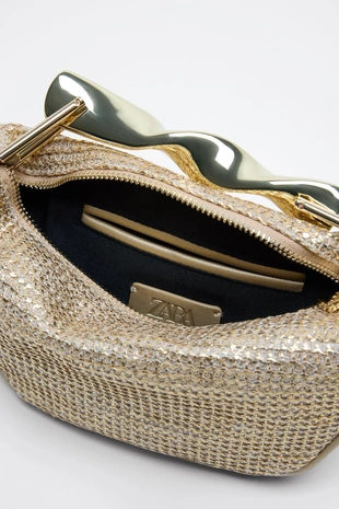 Небольшая сумка с металлической ручкой- Заказать в России