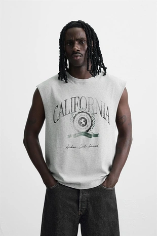 Топ с принтом и эффектом потертости- Заказать в России