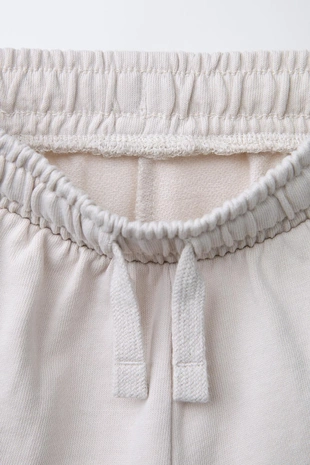 Шорты-бермуды джоггинг с текстом- Заказать в России