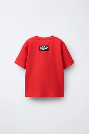 Футболка с граффити-принтом- Заказать в России