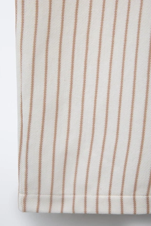 Комбинезон в полоску с волнистой отделкой- Заказать в России