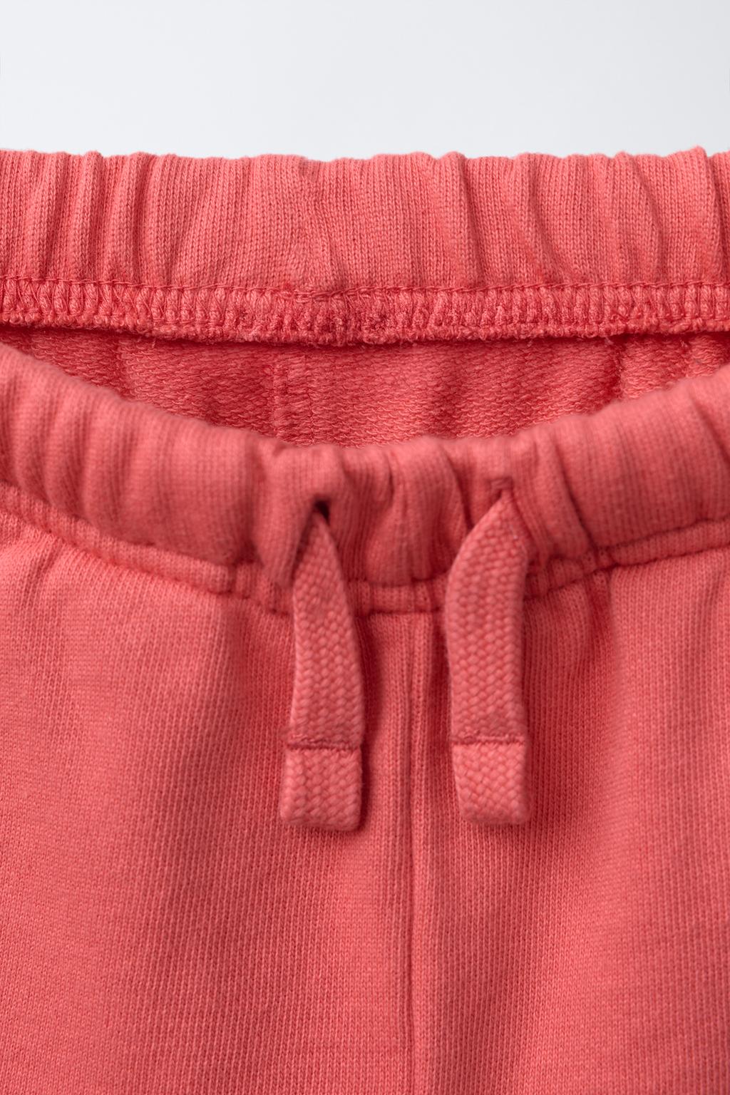 STRAIGHT FIT GARMENT-DYED PLUSH BERMUDA SHORTS WITH LABEL