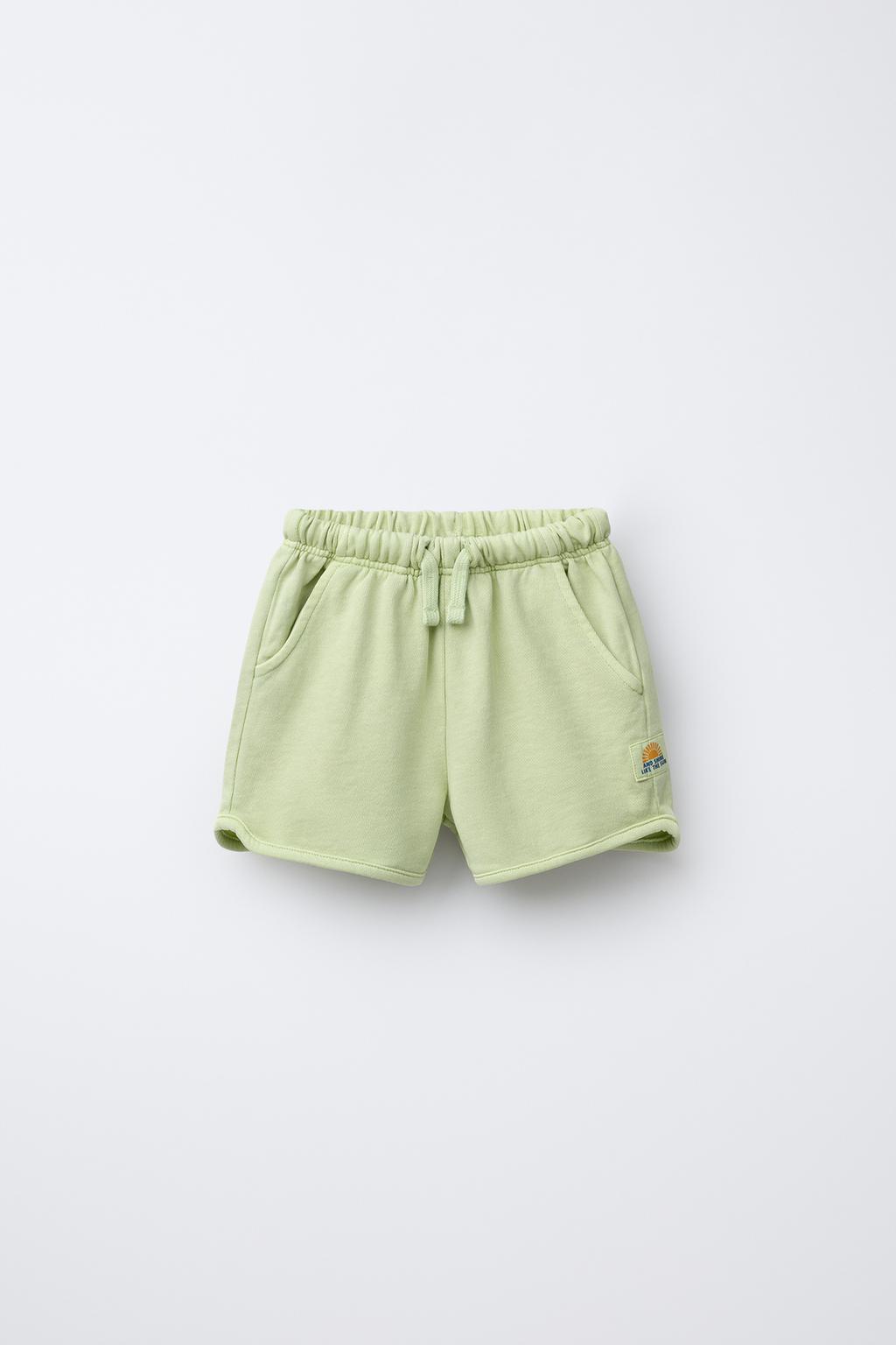 STRAIGHT FIT GARMENT-DYED PLUSH BERMUDA SHORTS WITH LABEL