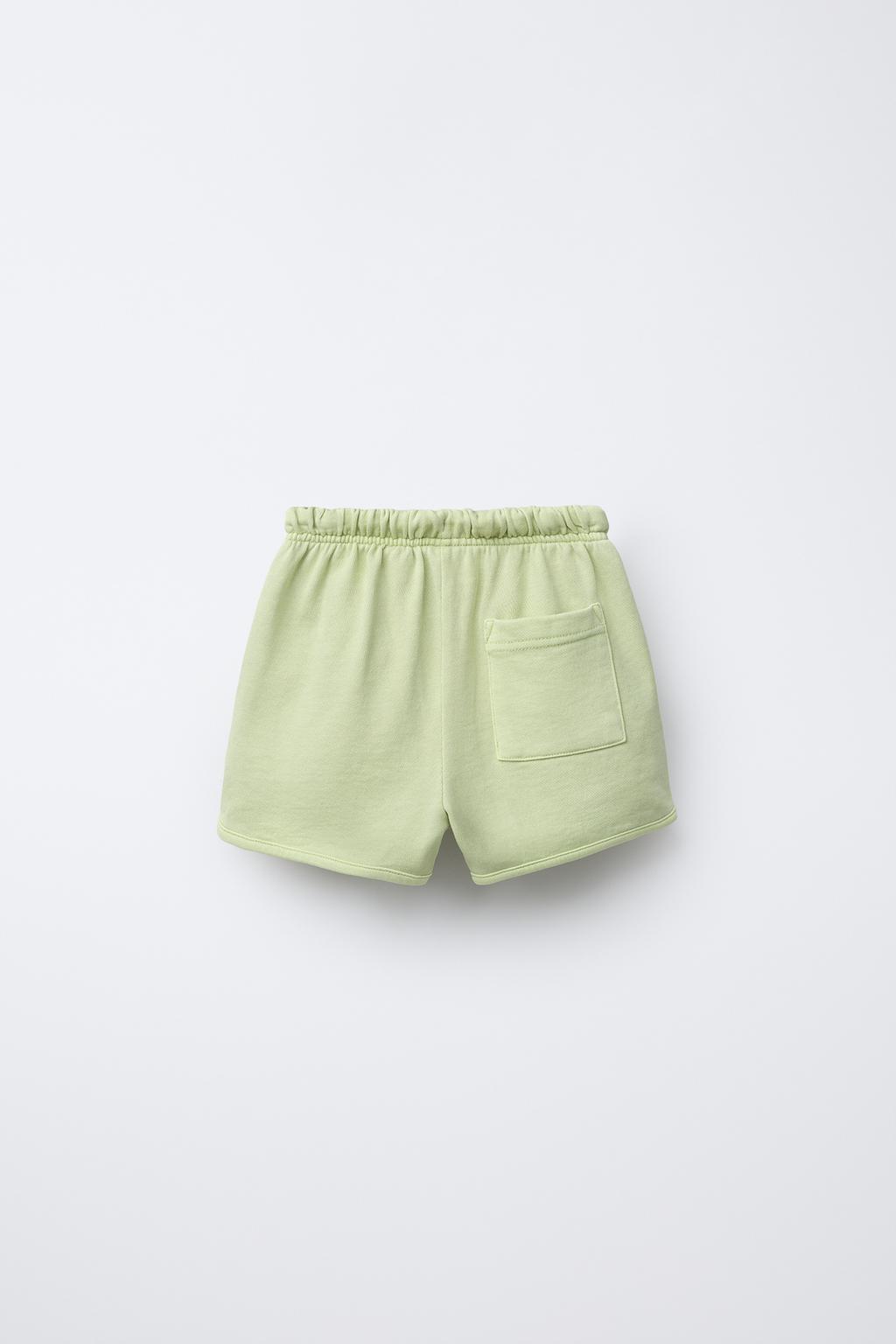 STRAIGHT FIT GARMENT-DYED PLUSH BERMUDA SHORTS WITH LABEL