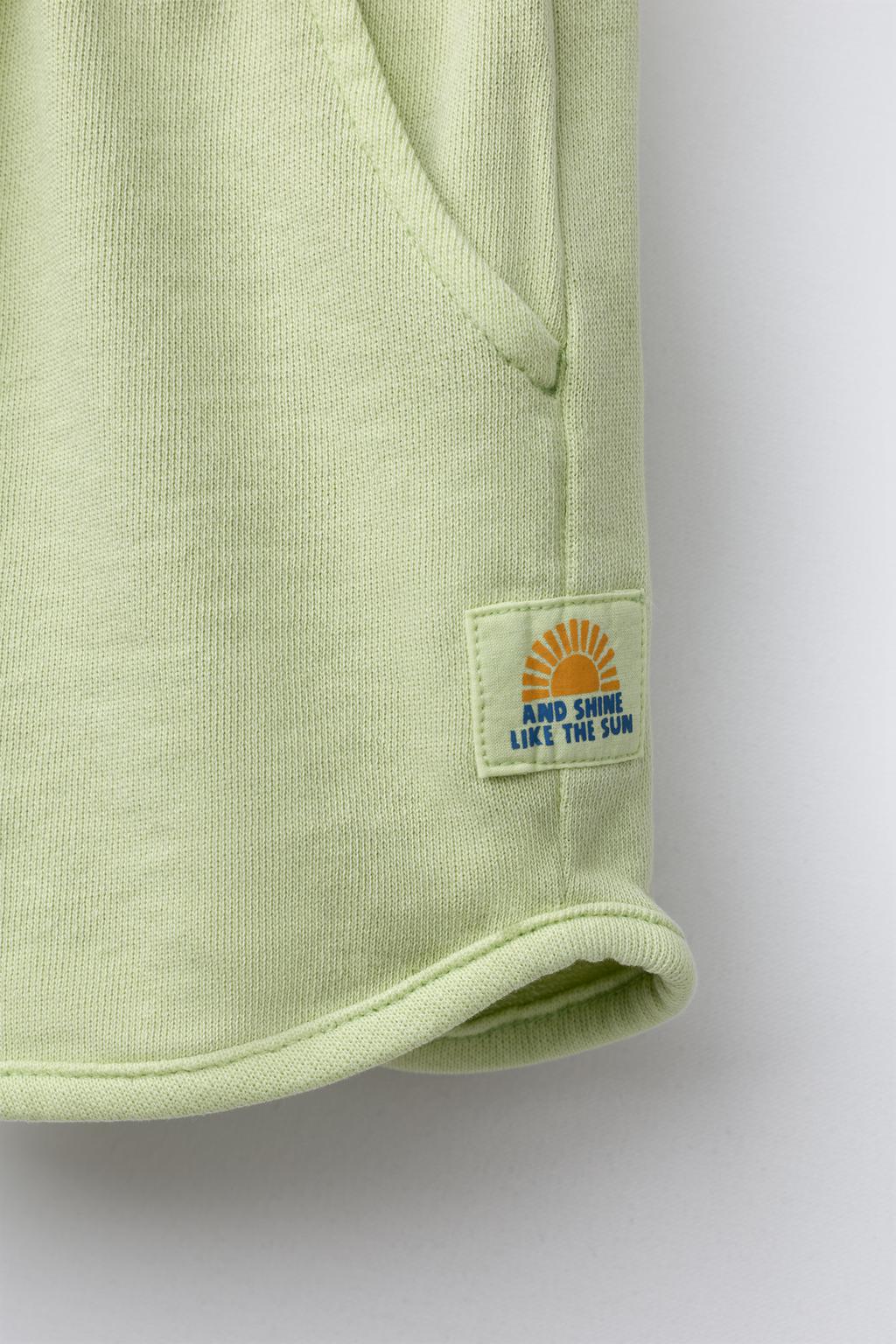 STRAIGHT FIT GARMENT-DYED PLUSH BERMUDA SHORTS WITH LABEL