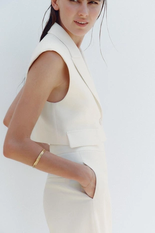 Короткий жилет с клапанами- Заказать в России