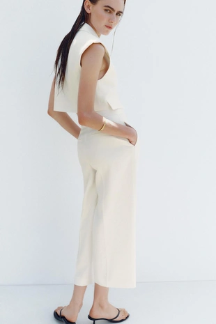 Короткий жилет с клапанами- Заказать в России