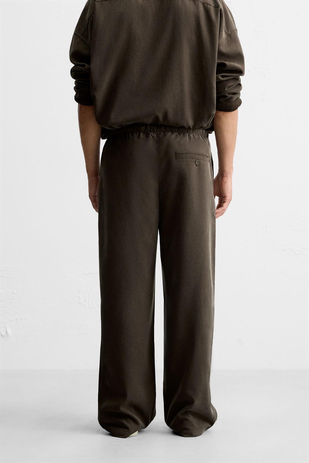 БРЮКИ RELAXED FIT ИЗ СТРУЯЩЕЙСЯ ТКАНИ