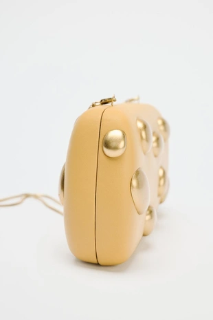 Клатч с металлическими аппликациями- Заказать в России