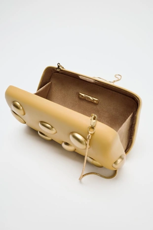 Клатч с металлическими аппликациями- Заказать в России