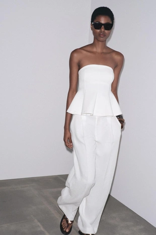 Топ из интерлока с баской- Заказать в России