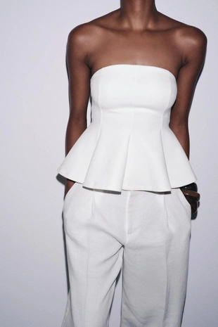 Топ из интерлока с баской- Заказать в России