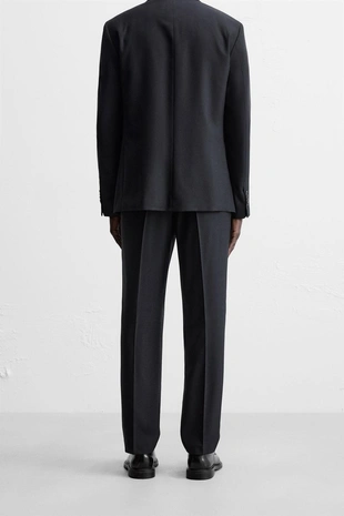 Костюмные брюки в елочку- Заказать в России