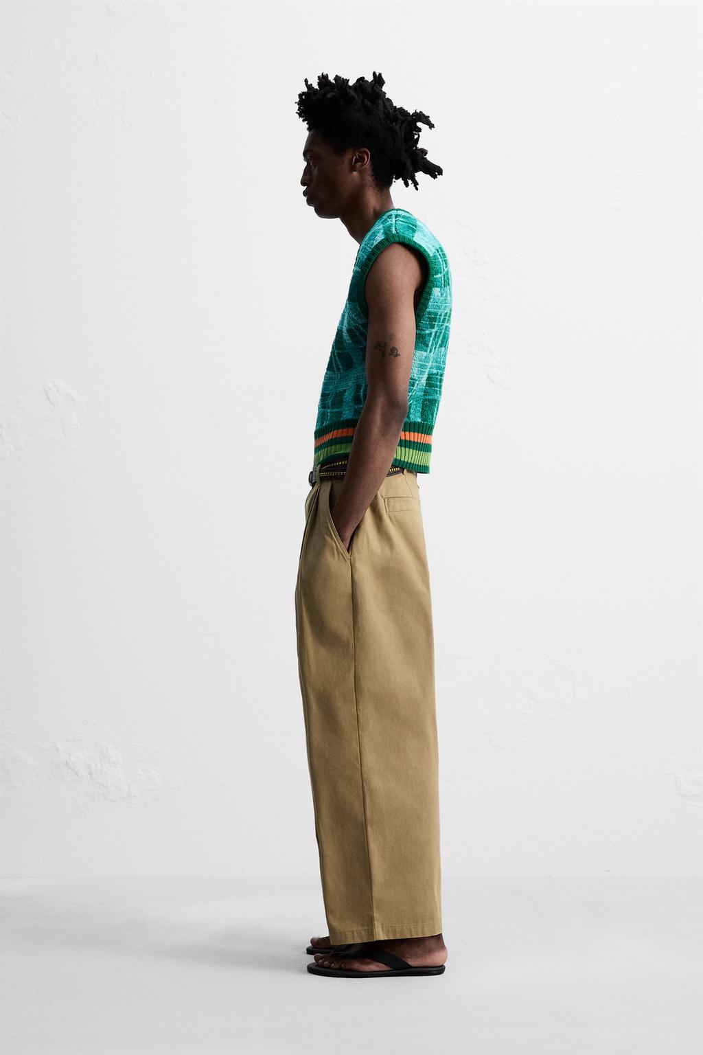 БРЮКИ WIDE FIT СО СКЛАДКАМИ © OTIS KWAME KYE QUAICOE