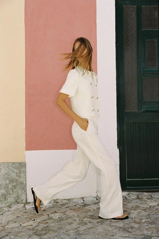 Прямые брюки из льняной ткани с контрастной строчкой- Заказать в России