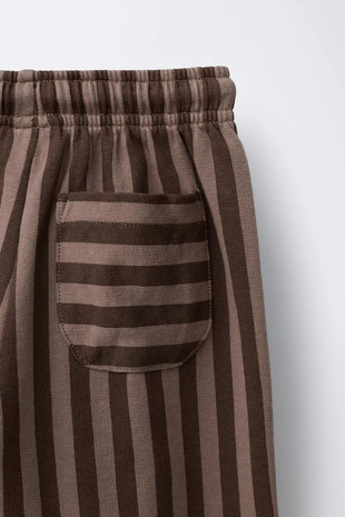 Прямые брюки в полоску- Заказать в России