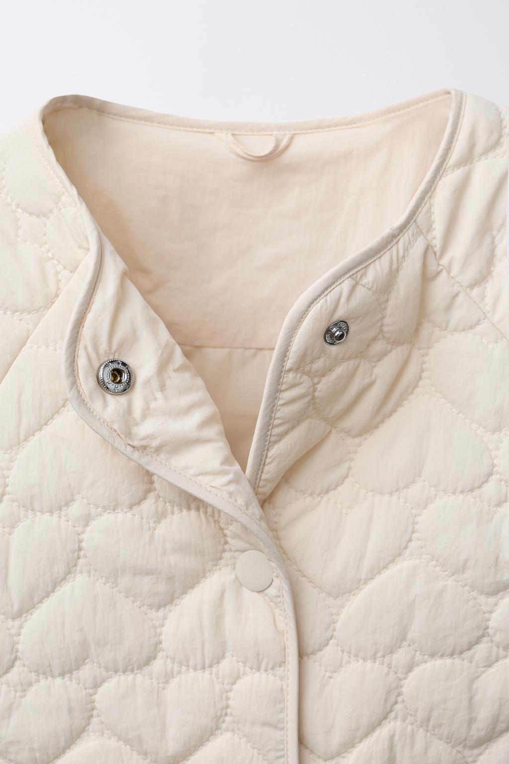СТЕГАНАЯ КУРТКА С ЭТИКЕТКОЙ WATER REPELLENT