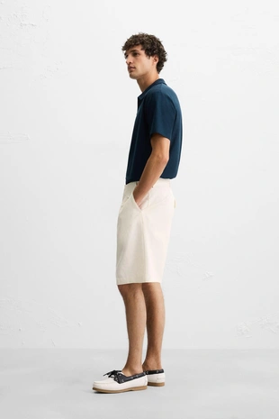 Поло с рельефным рисунком- Заказать в России