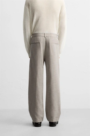 Брюки REGULAR FIT из ткани с текстурой- Заказать в России