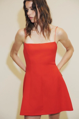 Короткое эластичное платье с бантом- Заказать в России