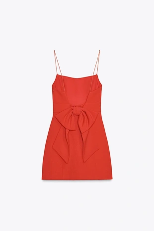 Короткое эластичное платье с бантом- Заказать в России