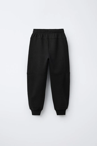 Комбинированные брюки-джоггеры из вафельной ткани- Заказать в России