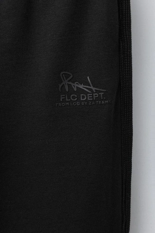 Комбинированные брюки-джоггеры из вафельной ткани- Заказать в России