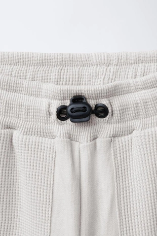 Комбинированные брюки-джоггеры из вафельной ткани