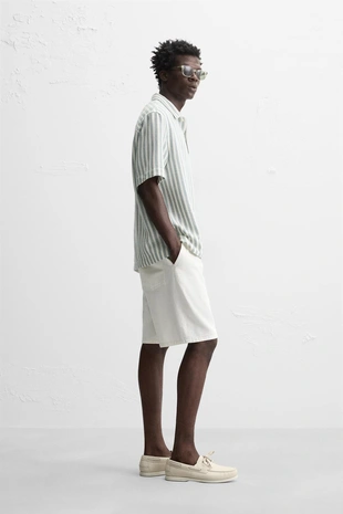 Поло с рельефным рисунком «елочка»- Заказать в России