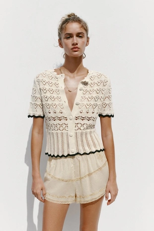 Кардиган с короткими рукавами и ажурной вязкой- Заказать в России