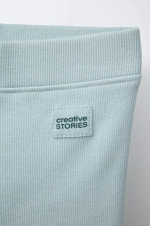 Легинсы в рубчик с нашивкой- Заказать в России