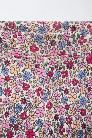 Легинсы в рубчик с принтом