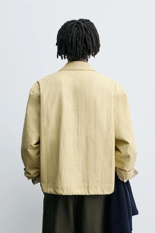 Укороченная куртка структурного кроя- Заказать в России