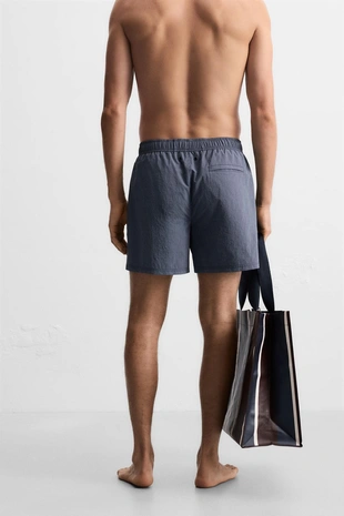 Купальник в полоску среднего размера- Заказать в России