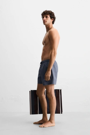 Купальник в полоску среднего размера- Заказать в России