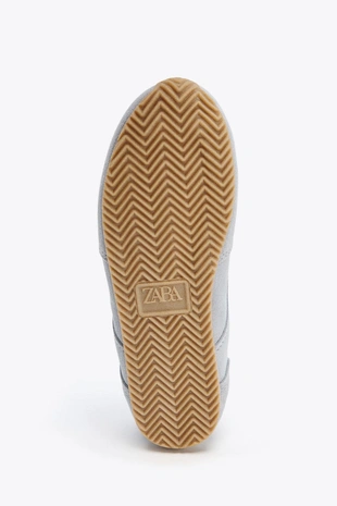 Кожаные кроссовки с контрастными деталями- Заказать в России