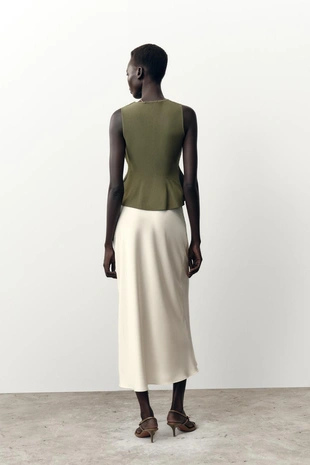 Трикотажный топ с баской- Заказать в России