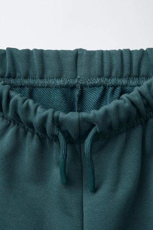 Брюки-джоггеры с разрезами- Заказать в России