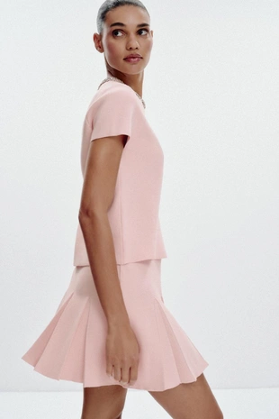 Трикотажная мини-юбка в складку- Заказать в России