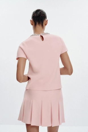 Трикотажная мини-юбка в складку- Заказать в России