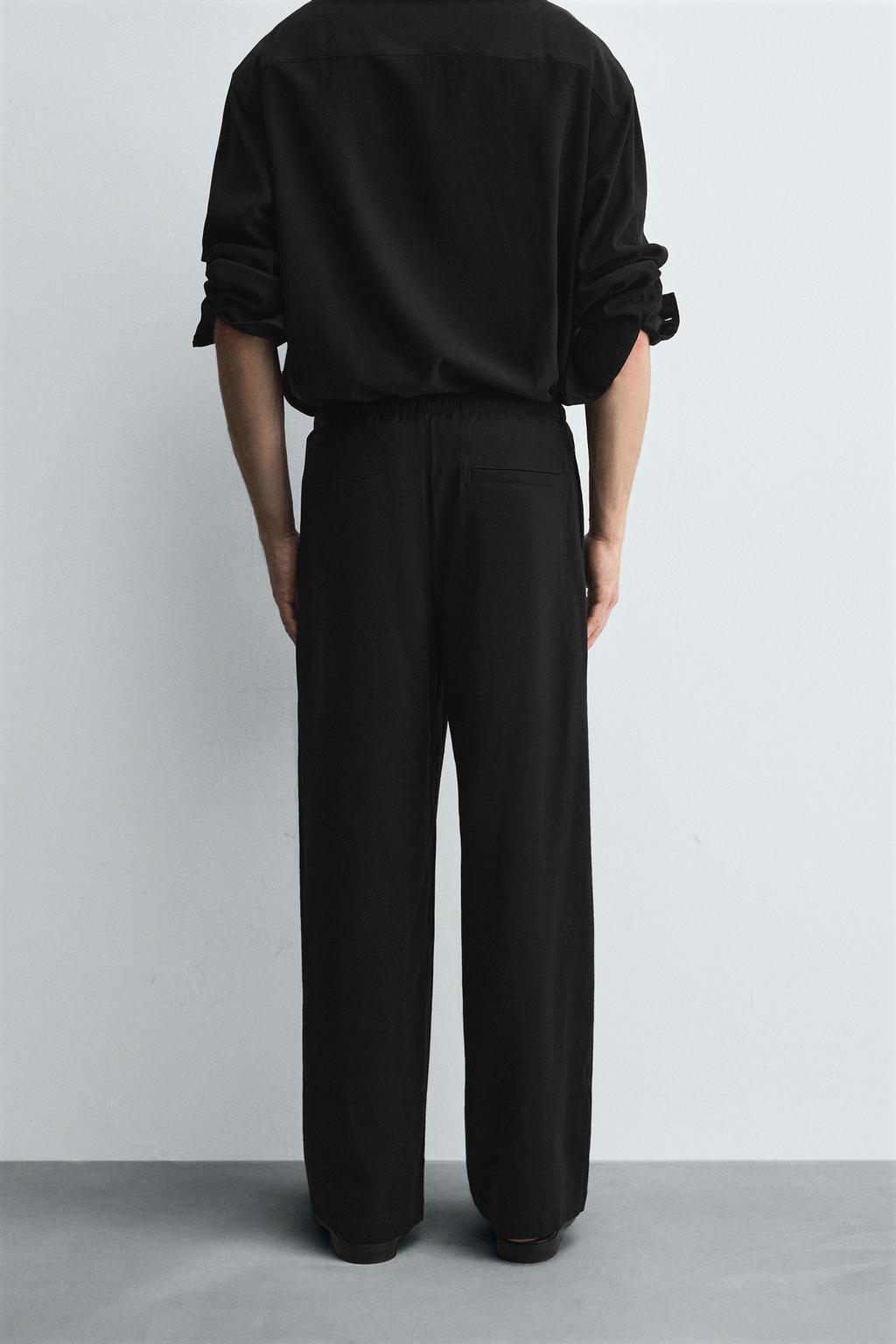 СТРУЯЩИЕСЯ БРЮКИ RELAXED FIT