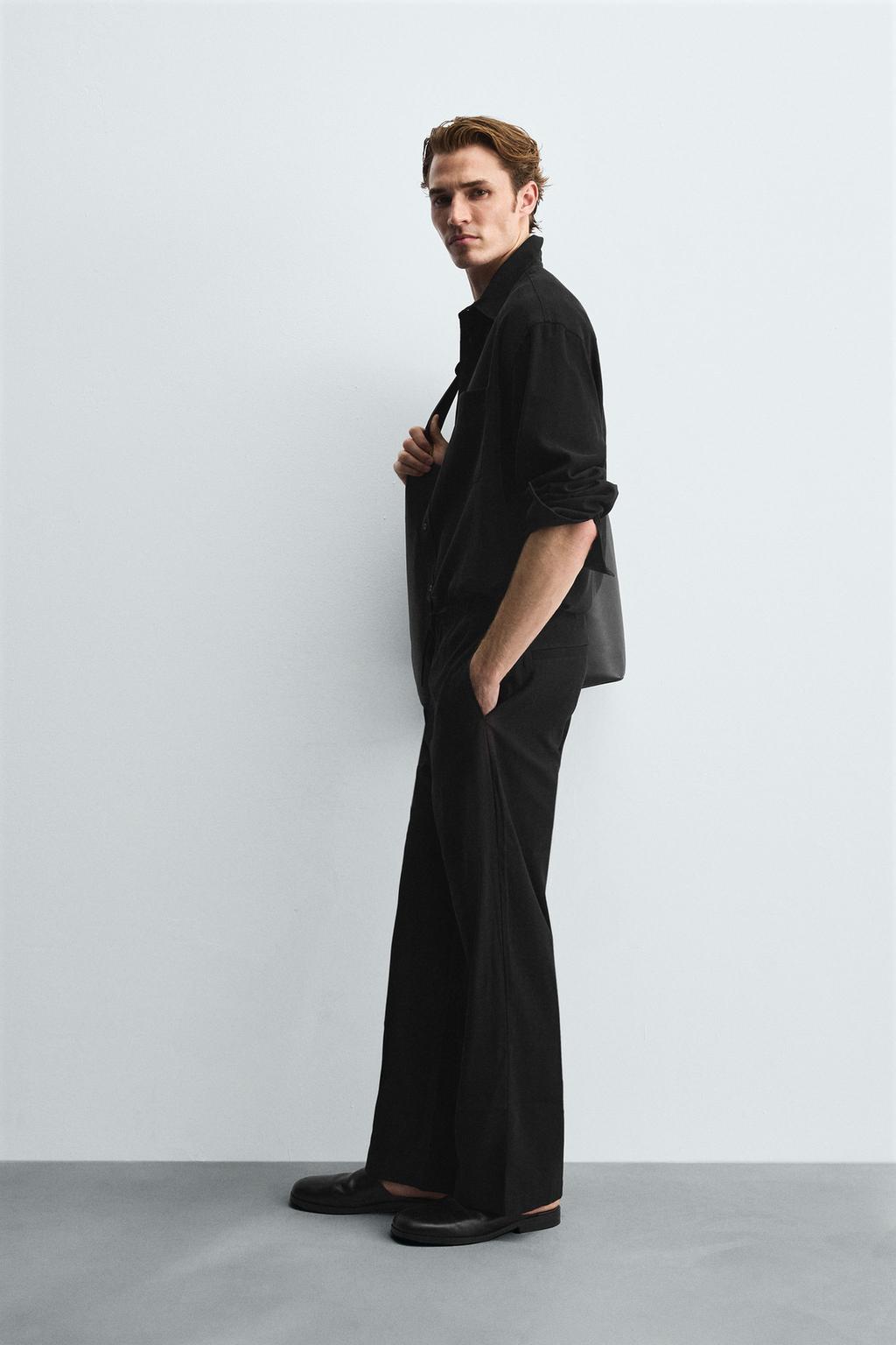 СТРУЯЩИЕСЯ БРЮКИ RELAXED FIT
