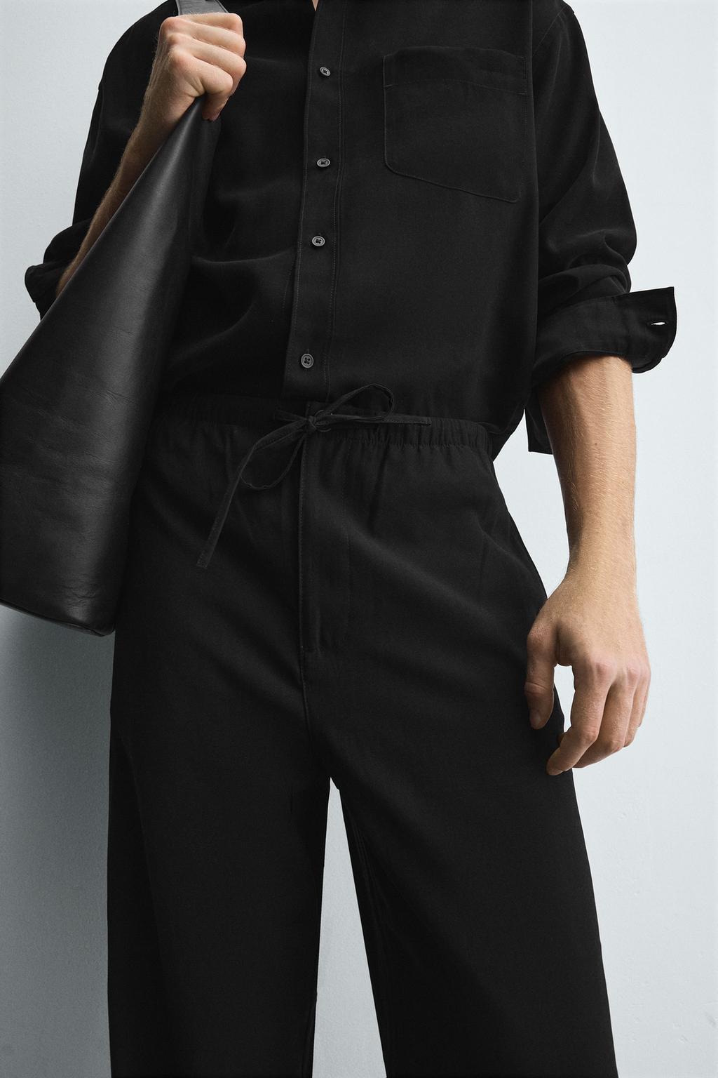 СТРУЯЩИЕСЯ БРЮКИ RELAXED FIT