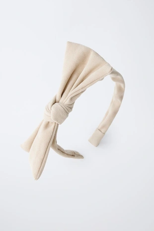 Ободок с бантом из ткани пике