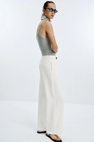 Брюки со шлевками и контрастной строчкой- Заказать в России