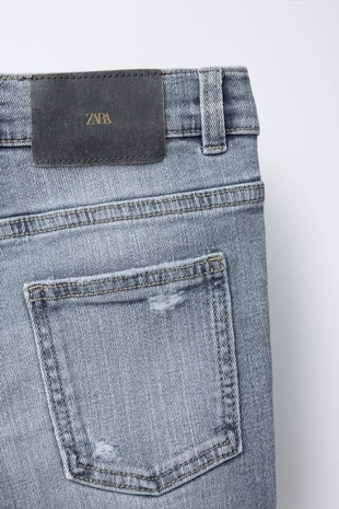 Джинсы SKINNY с разрезами- Заказать в России